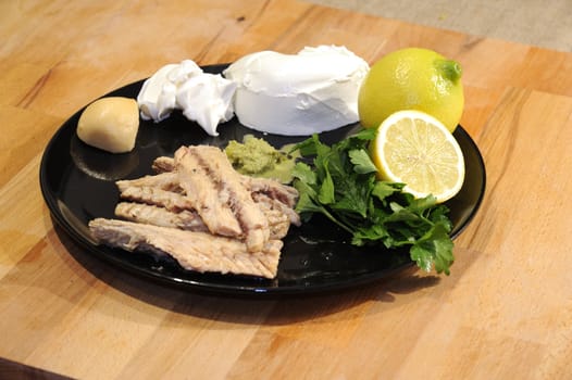 The ingredients for the preparation of the sauce for a tuna appetizer