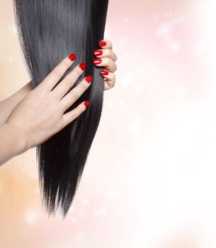 Long straight black hair with red nails