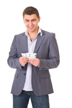 Young guy in casual style holding cash isolated on white