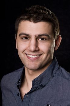 Casual caucasian man portrait on black background