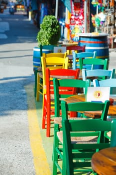 Typical restaurant with colorful chairs, Greece