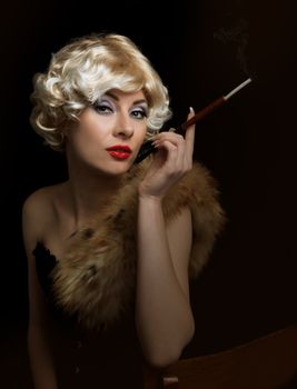 Blond retro-styled woman with cigarette over black