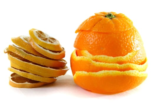 peeling and sliced dried orange  on white isolated background