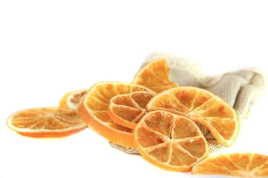 dried orange slice on isolated white background