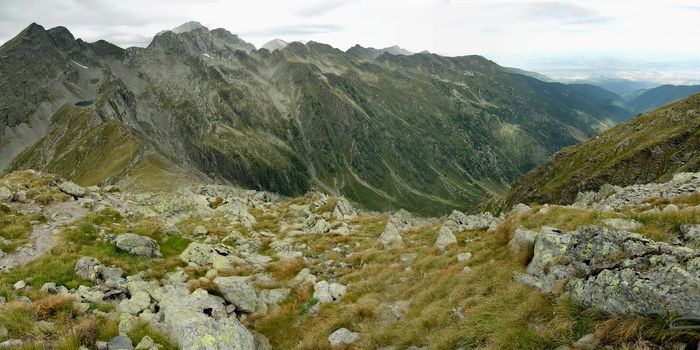 Small, fragmneted stones cover the mountain side.