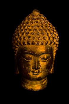 Buddha portrait on a dark background