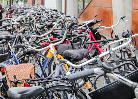 Detail of bikes parked in a center street of Amsterdam