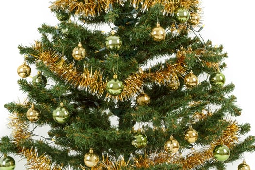 Decorated christmas tree with yellow and green balls on white background