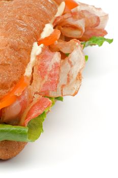 Big Tasty Ciabatta Sandwich with Bacon, Lettuce, Tomato, Cheese and Sauces isolated on white background
