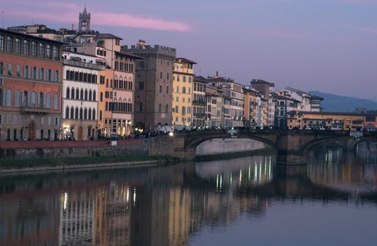 The banks of the Arno river in Florence on a winter evening