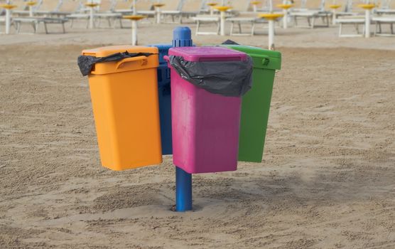 Garbage cans on the beach in Cervia in Italy