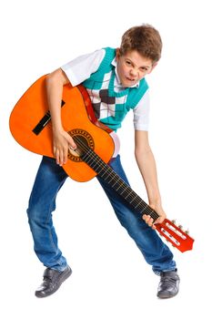 Cute boy with classical guitar. Isolated on white background