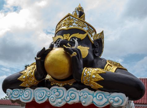 Statue of giant in traditional Thai style molding art. Generality in Thailand, any kind of temple, art decorated in Buddhist church, temple etc. created with money donated by people to hire artist. They are public domain, no restrict in copy or use. This photo is taken under these conditions.