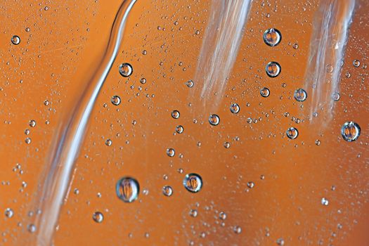 Macro picture of water droplets on window, shallow DOF