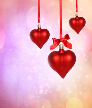 Valentine heart ornaments with pink grunge background