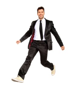 handsome jumping man on suit isolated on a white background