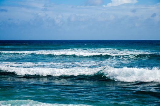 Blue ocean waves coming to shore in San Andres y Providencia, Colombia