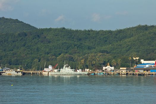 Ship in industrial port and sky landscape