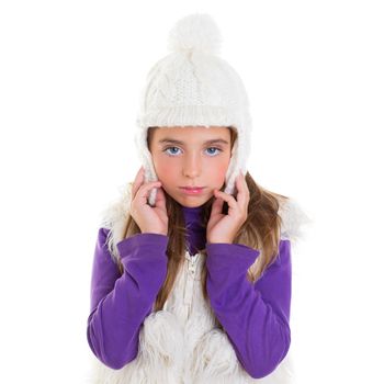 blue eyes child kid girl with white winter cap fur and purple