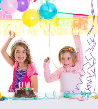 children happy birthday party girls with balloons and chocolate cake