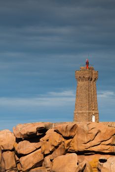 The lighthouse on the granite coast , Brittany, France