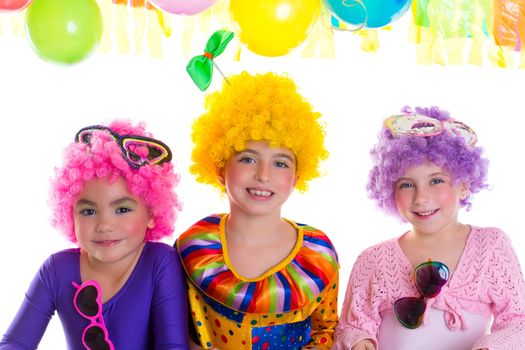Children happy birthday party with clown wigs colorful holiday celebration