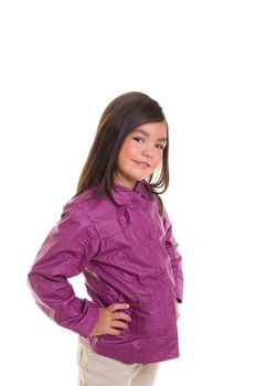 Asian child girl smiling with winter purple coat on white background