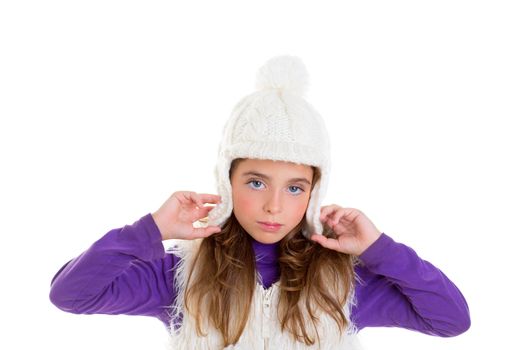 blue eyes child kid girl with white winter cap fur and purple