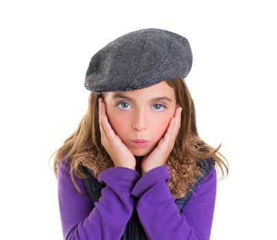 Child kid girl face expression of surprise hands in face on white with winter fashion cap