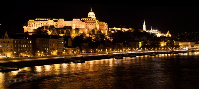 Buda Castle and Fisherman's Bastion by Danube river at night. Budapest, Hungary 