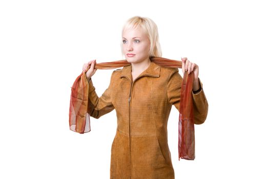 young woman in orange jacket with scarf