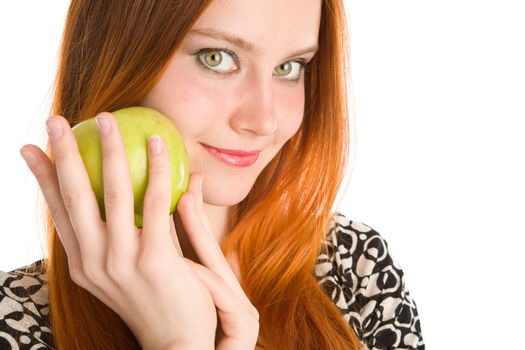 green tasty apple in hands of the girl