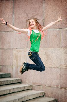 modern girl jumping on the staircase