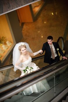 bride and groom in metro