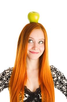 red haired girl with an apple on the head
