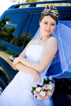 bride by the car