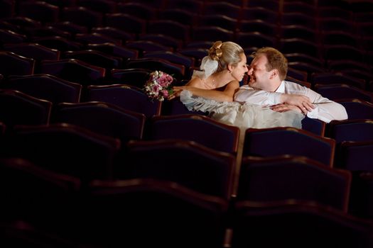 bride and groom at the theatre