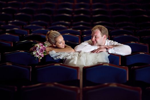 bride and groom at the theatre