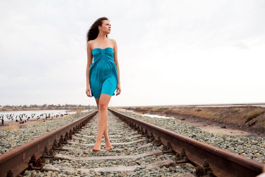 walking girl on the railway