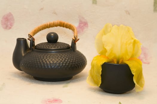  Yellow iris and black teapot and cup