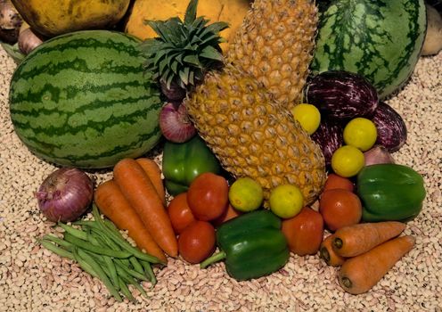 fresh vegetables and fruits on wooden table after market 