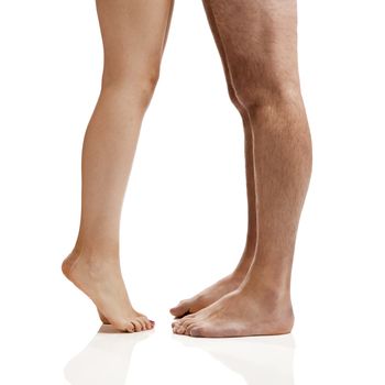 Man and woman legs isolated on a white background