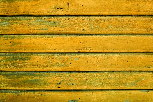 Background picture made of old yellow wood boards