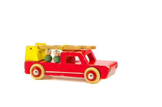 isolated on white background fire-engine wooden toy
