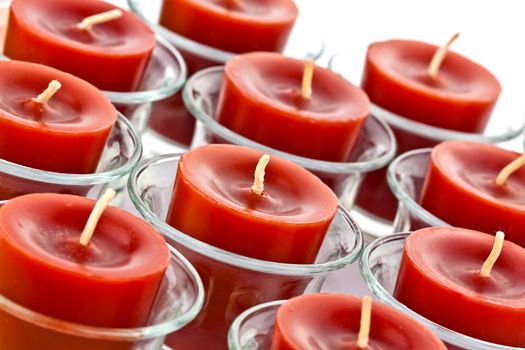 red candles on the glass candle holder
