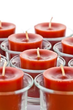 red candles on the glass candle holder