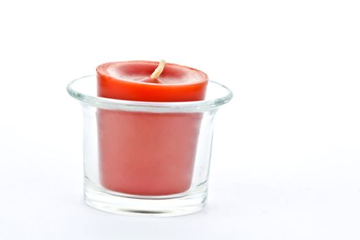 red candles on the glass candle holder