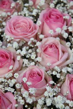 Wedding flowers, pink roses and white gypsophilia