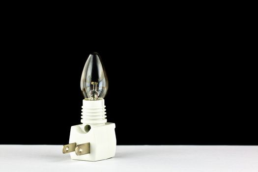 close up of a white mini wall lamp