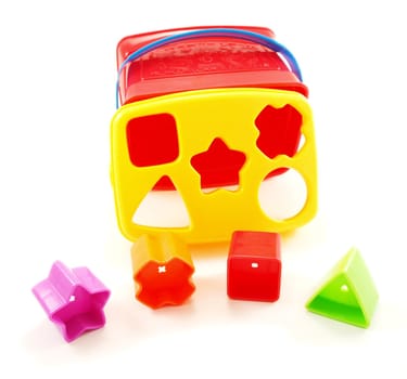 Shapes of plastic, toys for kids, assorted colors, isolated towards white